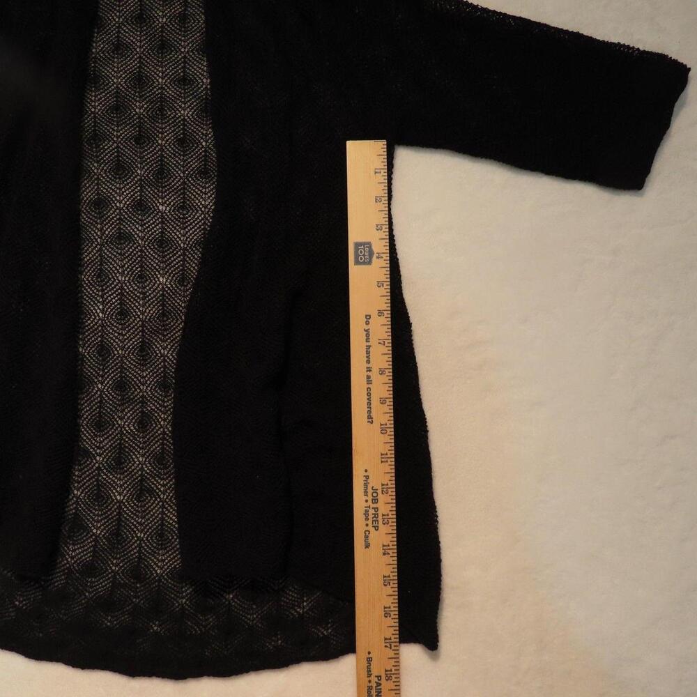 The product is a stylish Eileen Fisher women's black 100% wool open front knit c